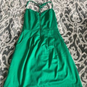 Green strapping tied dress.